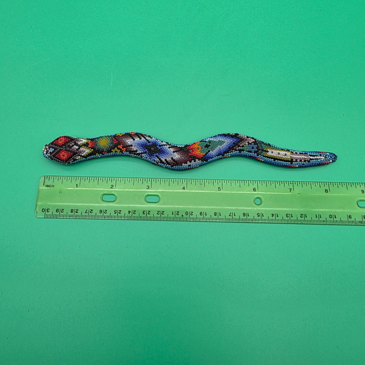 Huichol beaded snake sculpture