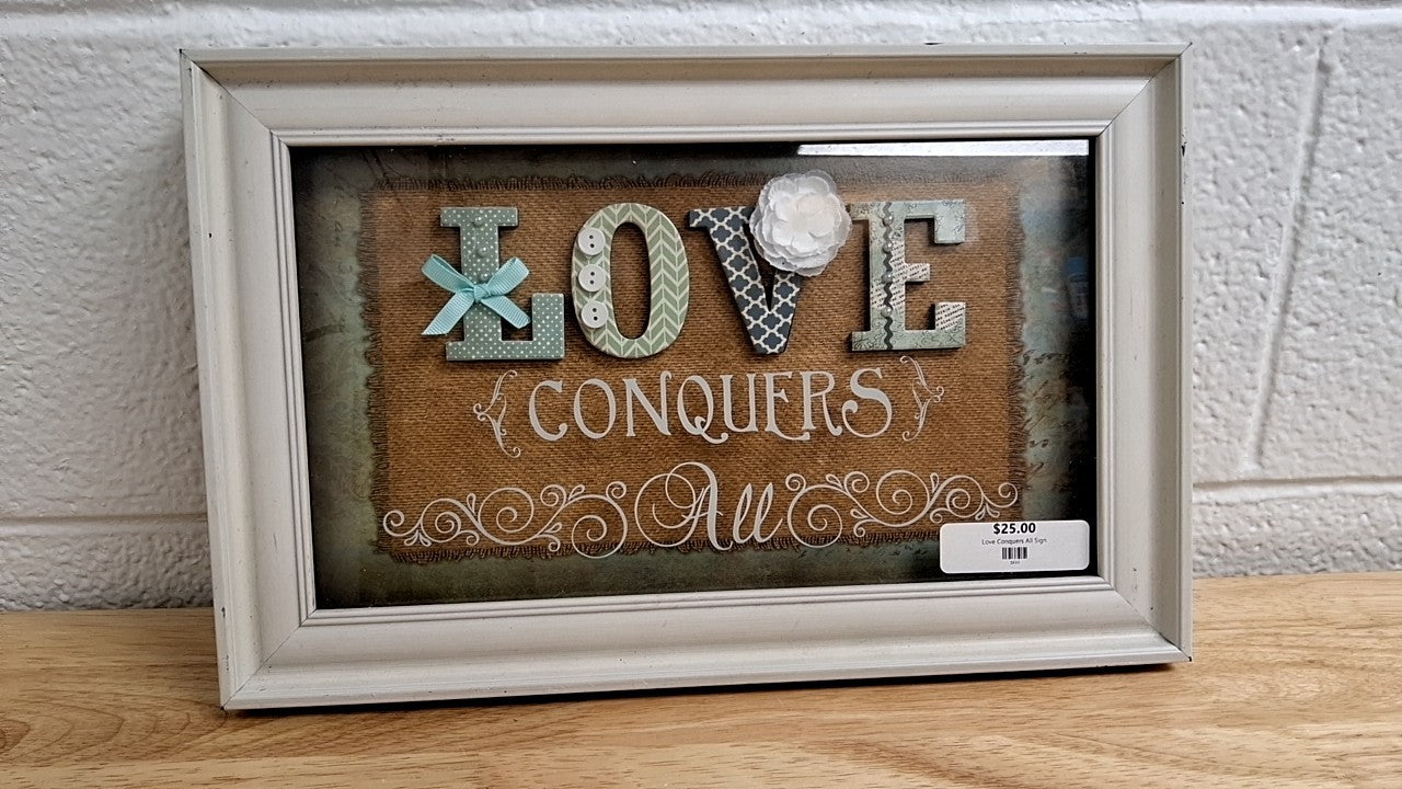Love Conquers All Sign
