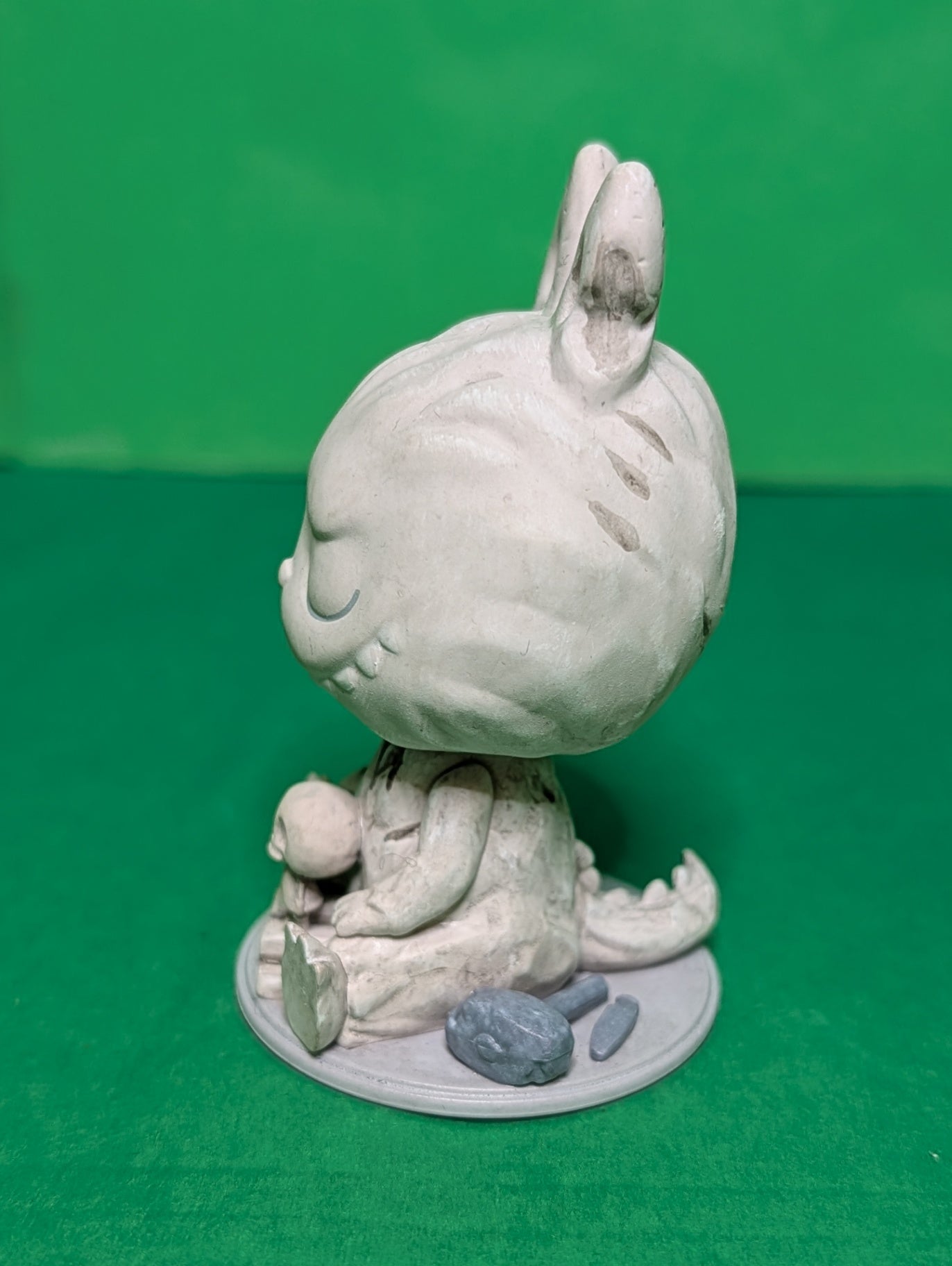 This is a Pop Mart Labubu "Sculpture" figure from THE MONSTERS Almost Hidden Series.