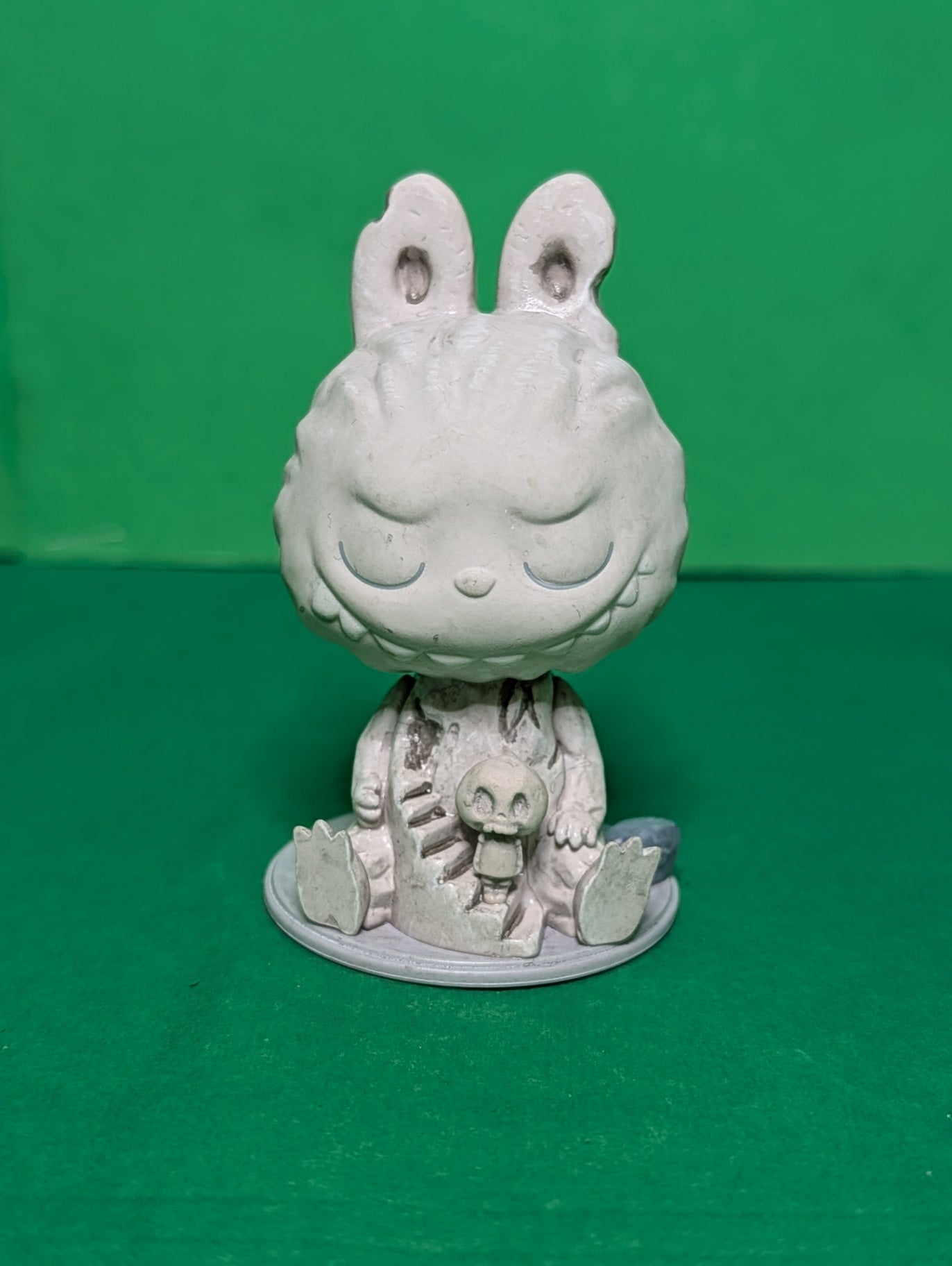 This is a Pop Mart Labubu "Sculpture" figure from THE MONSTERS Almost Hidden Series.