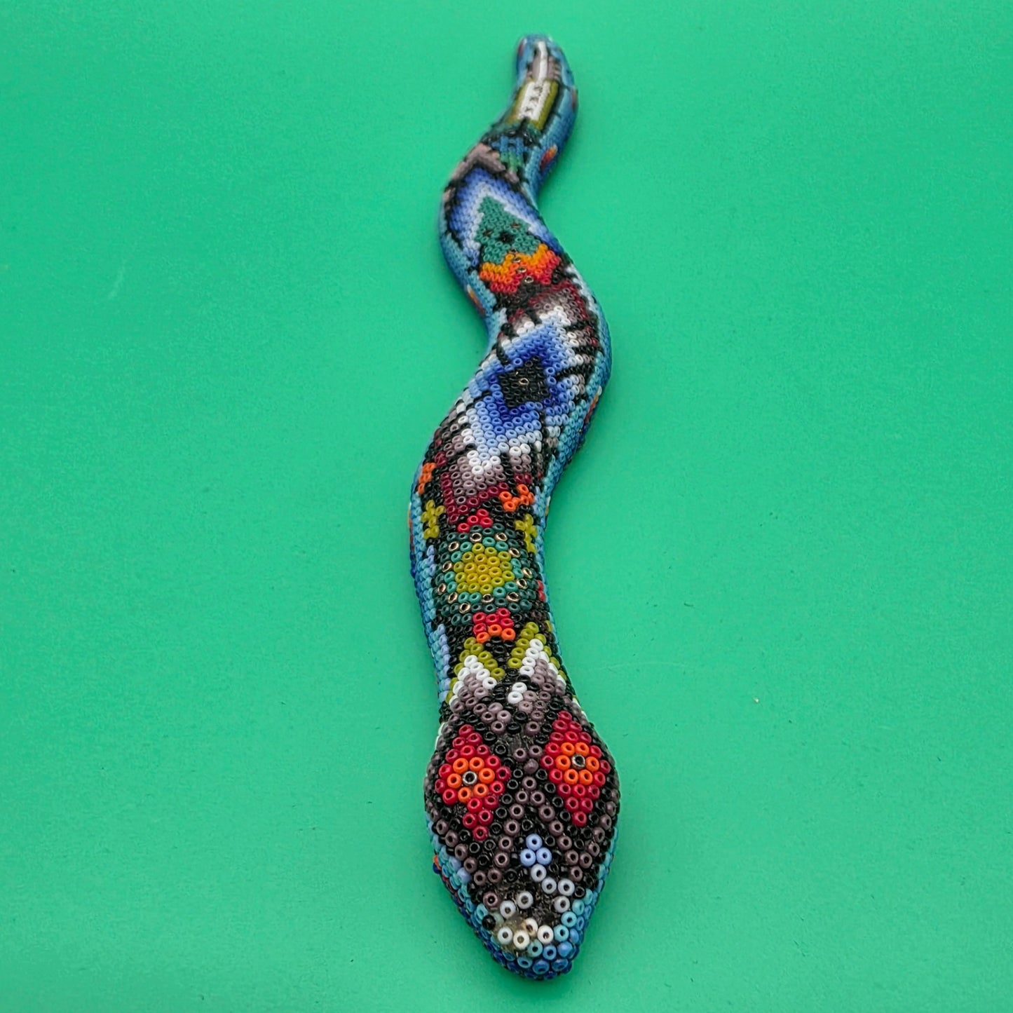 Huichol beaded snake sculpture