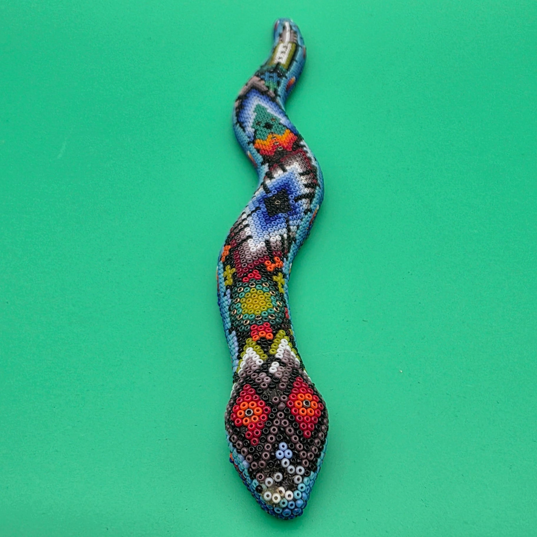 Huichol beaded snake sculpture
