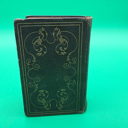 antique German-language hymn book titled Sammlung von Geistlichen Liedern, published in 1858 in Cincinnati.