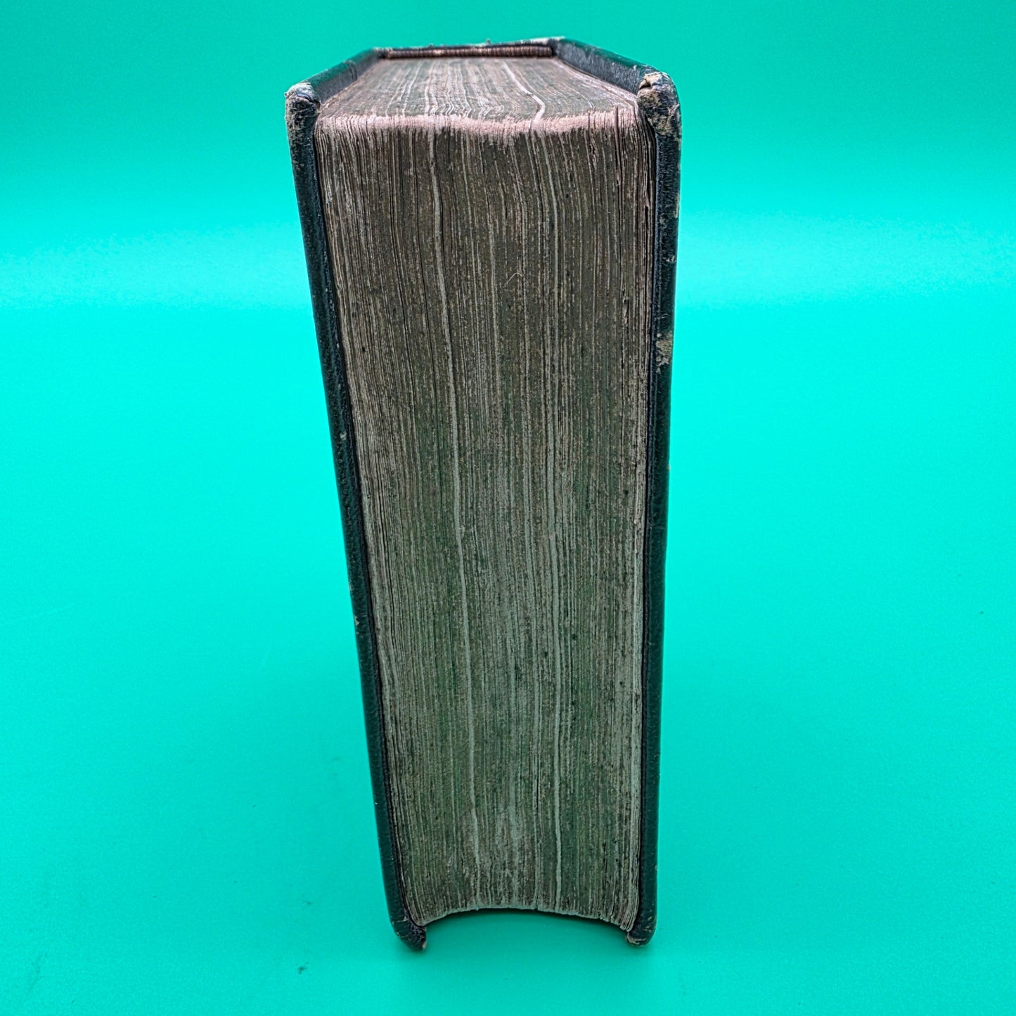 antique German-language hymn book titled Sammlung von Geistlichen Liedern, published in 1858 in Cincinnati.