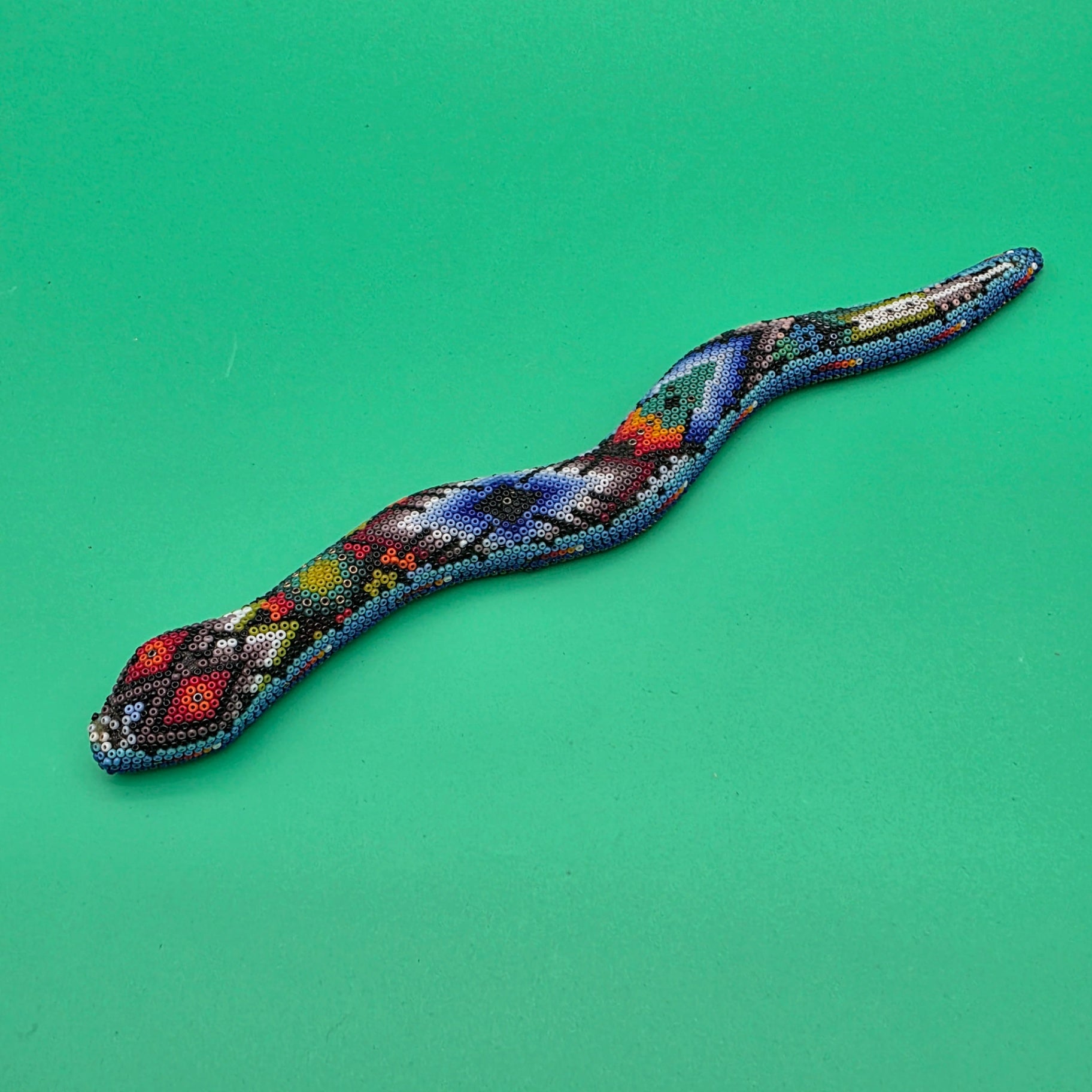 Huichol beaded snake sculpture
