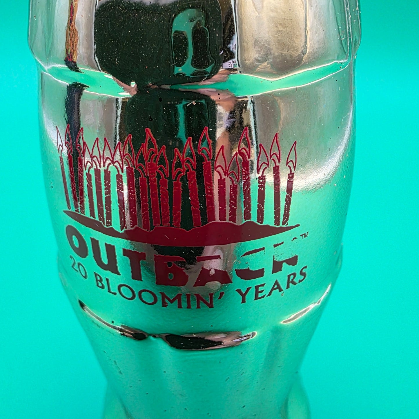 Commemorative Coca-Cola bottle celebrating the 20th anniversary Outback Steakhouse