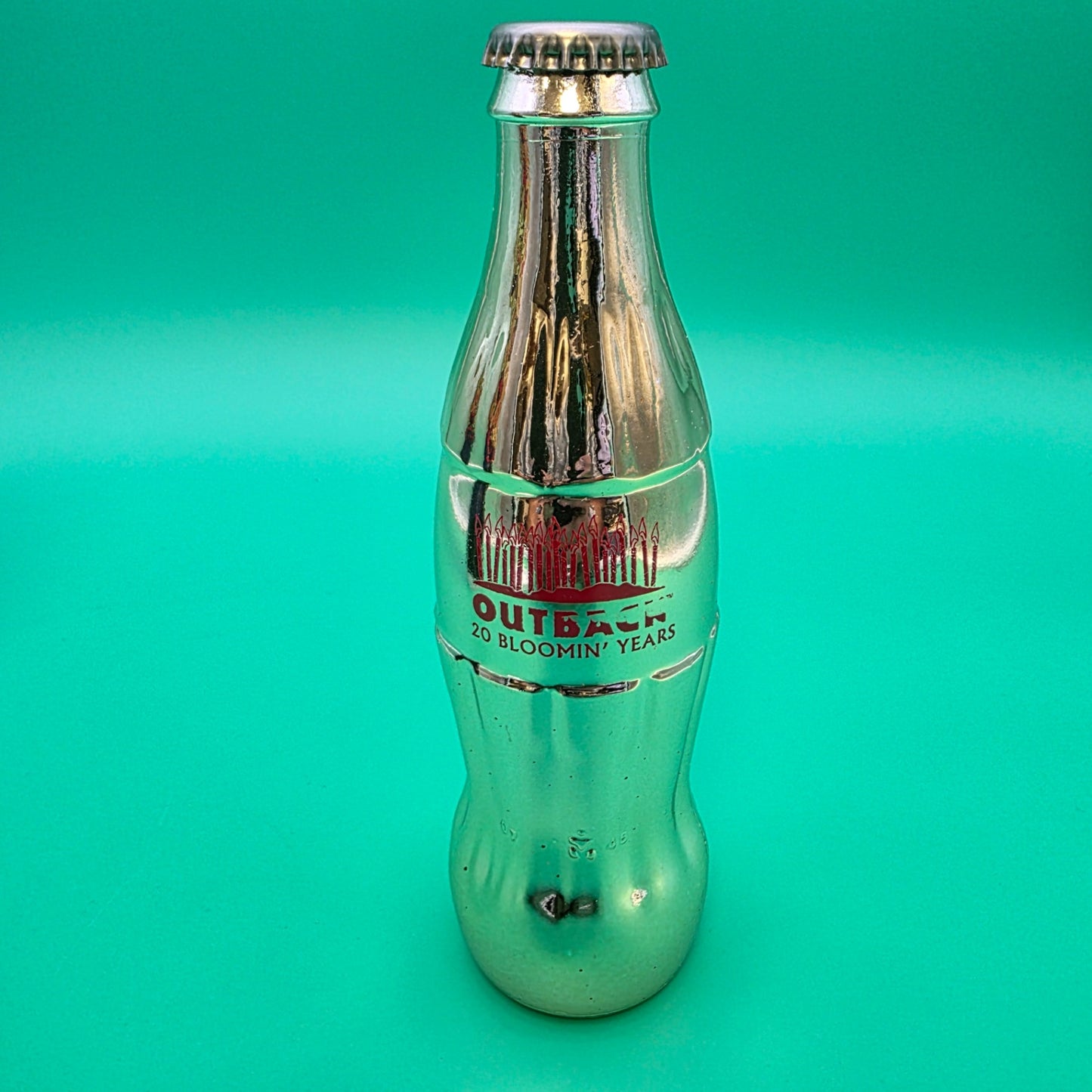 Commemorative Coca-Cola bottle celebrating the 20th anniversary Outback Steakhouse
