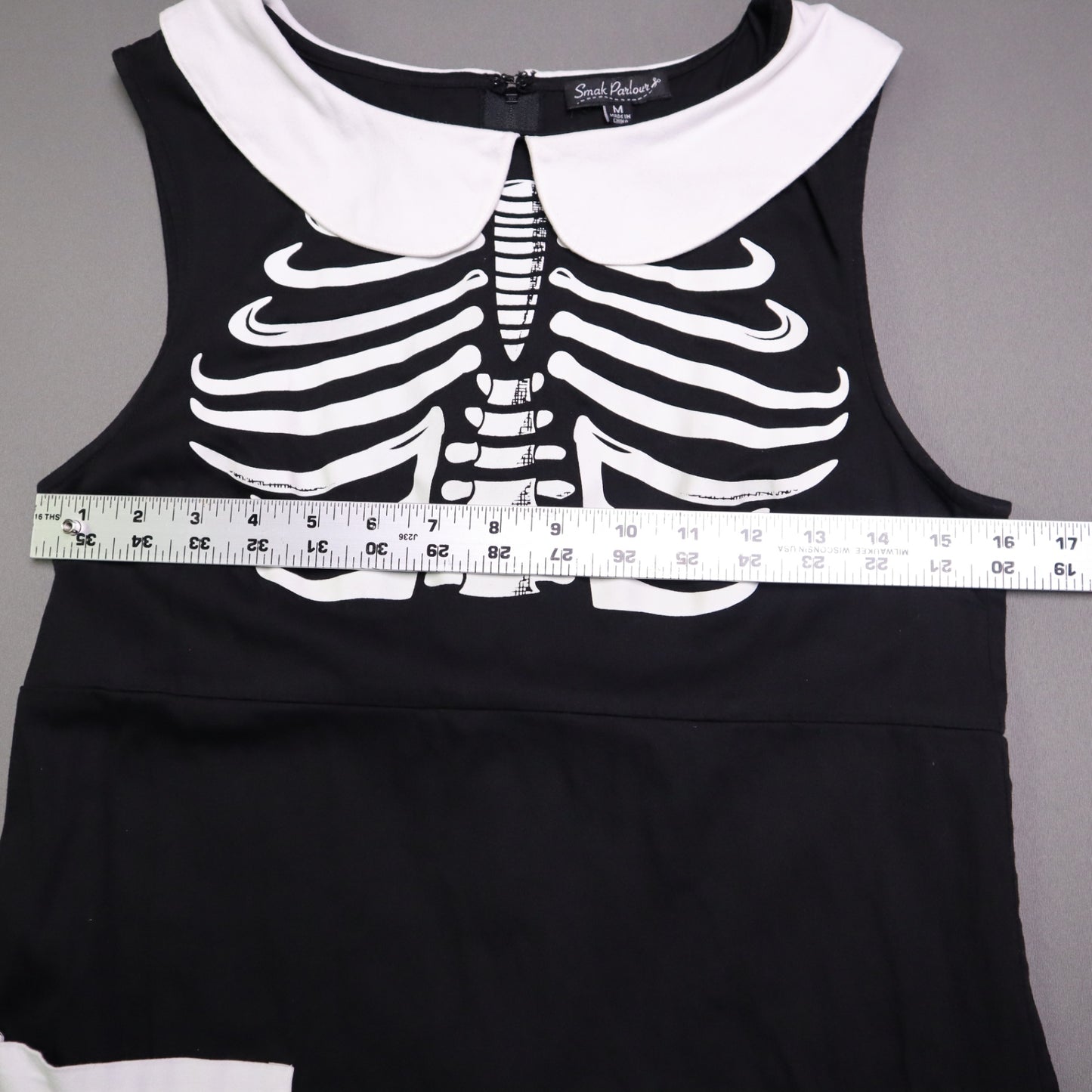 Smak Smak Parlour skeleton mod dress features a white Peter Pan collar and matching white pockets Online Only M
