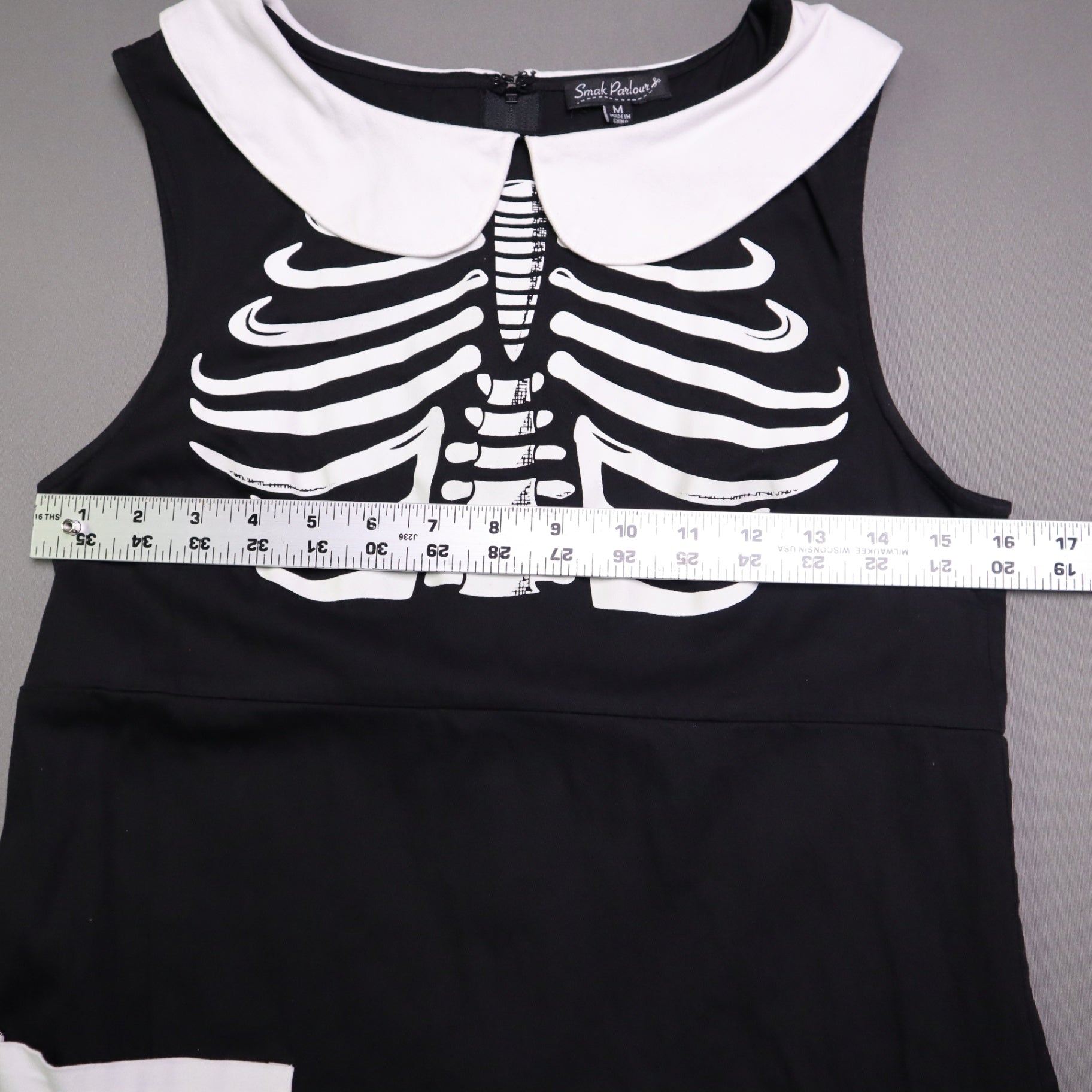 Smak Smak Parlour skeleton mod dress features a white Peter Pan collar and matching white pockets Online Only M