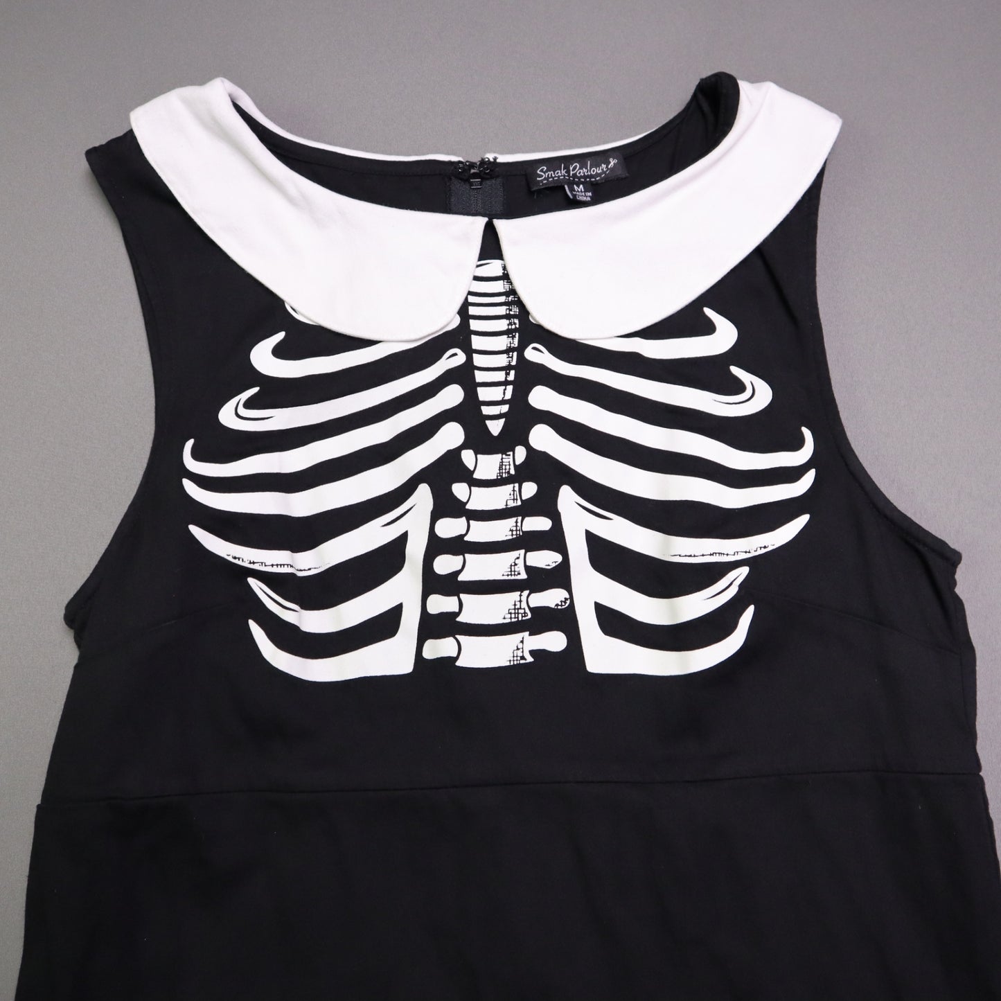 Smak Smak Parlour skeleton mod dress features a white Peter Pan collar and matching white pockets Online Only M