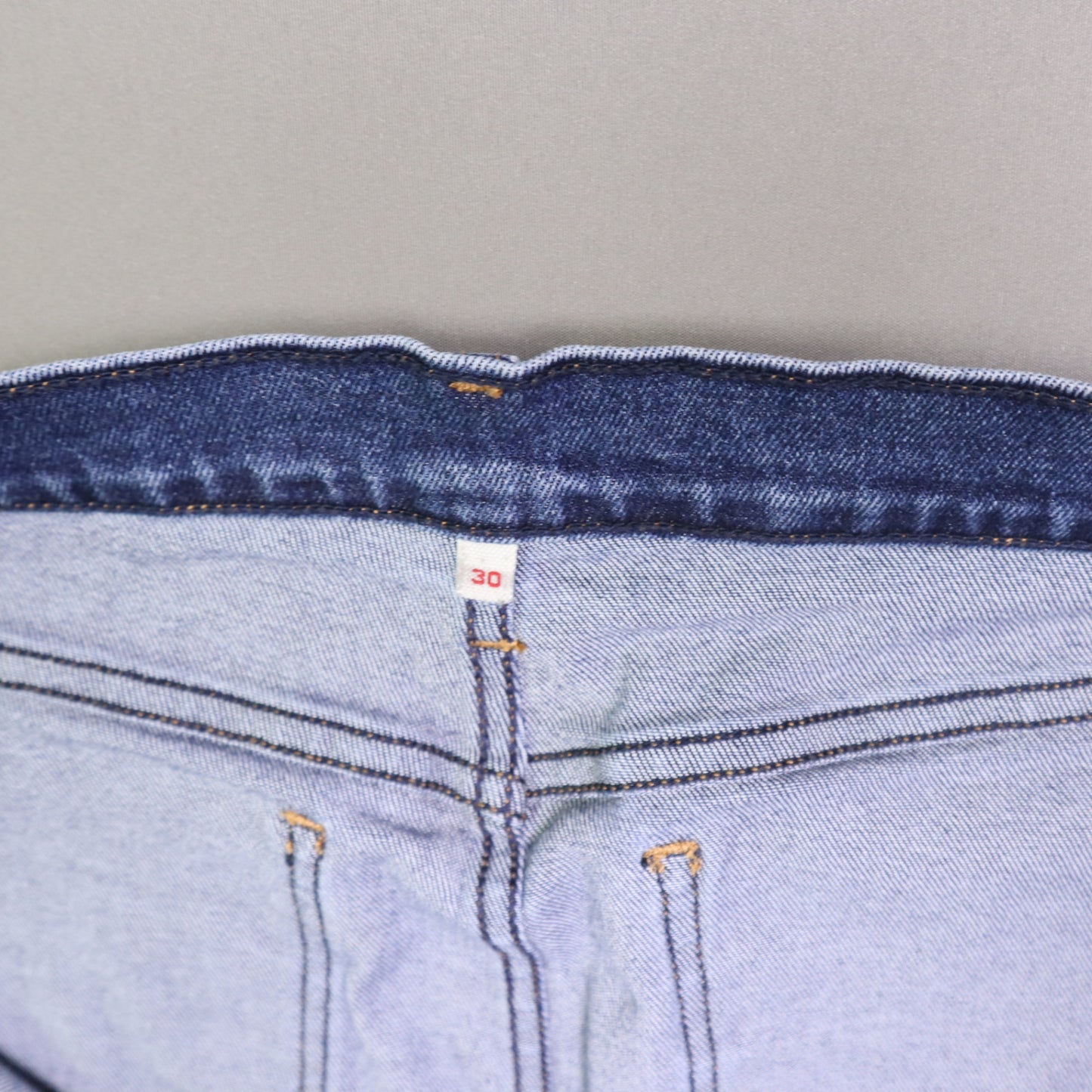 Levi's denim pencil skirt featuring a button-front design 30