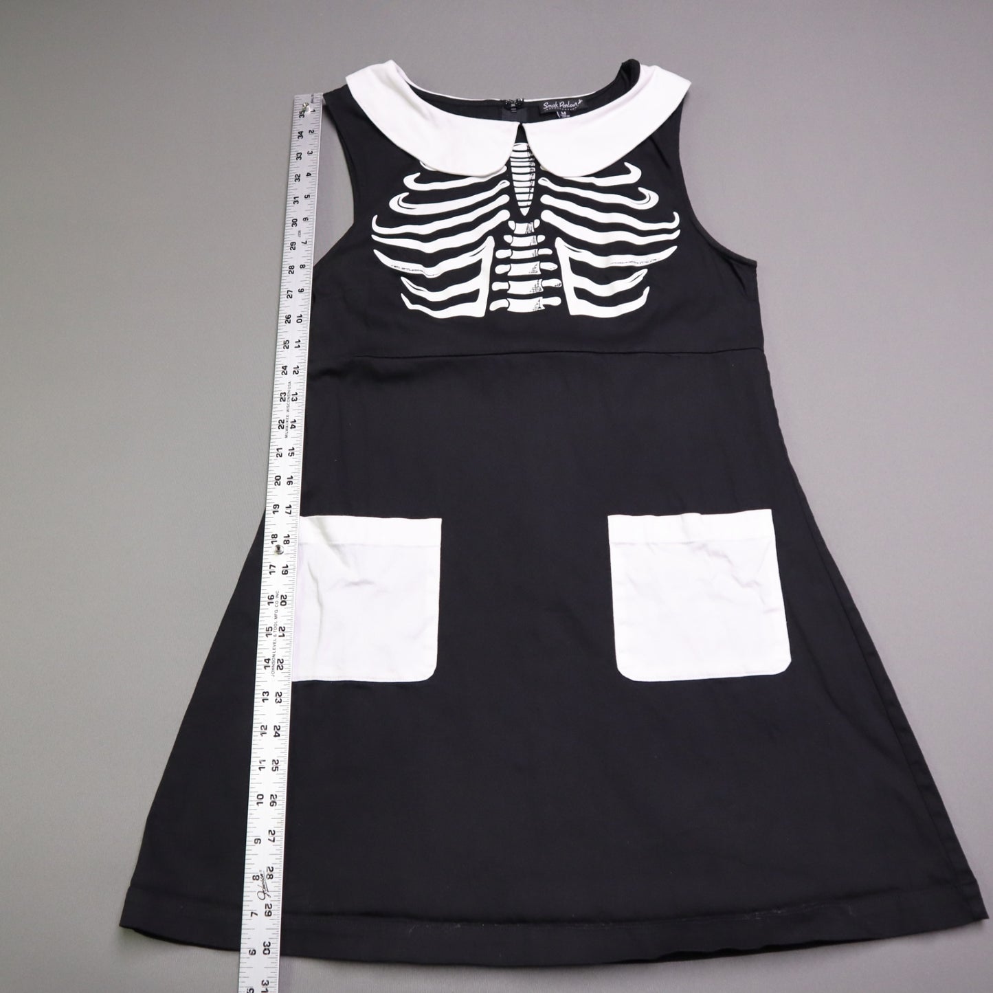 Smak Smak Parlour skeleton mod dress features a white Peter Pan collar and matching white pockets Online Only M