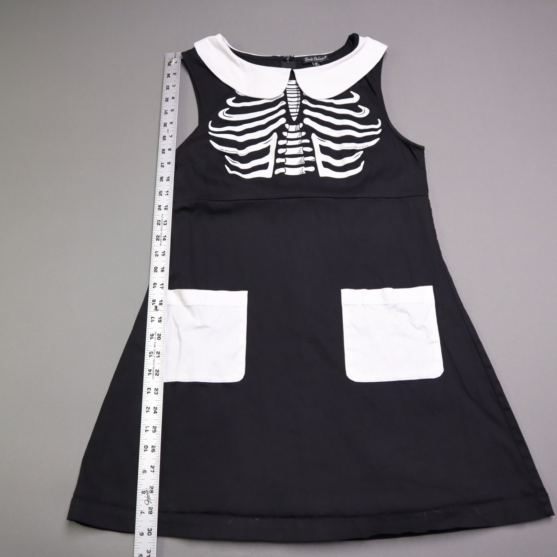 Smak Smak Parlour skeleton mod dress features a white Peter Pan collar and matching white pockets Online Only M