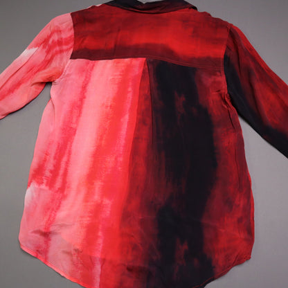 APNY brand button-up shirt features a vibrant red and pink gradient tie-dye pattern and a contrasting dark collar