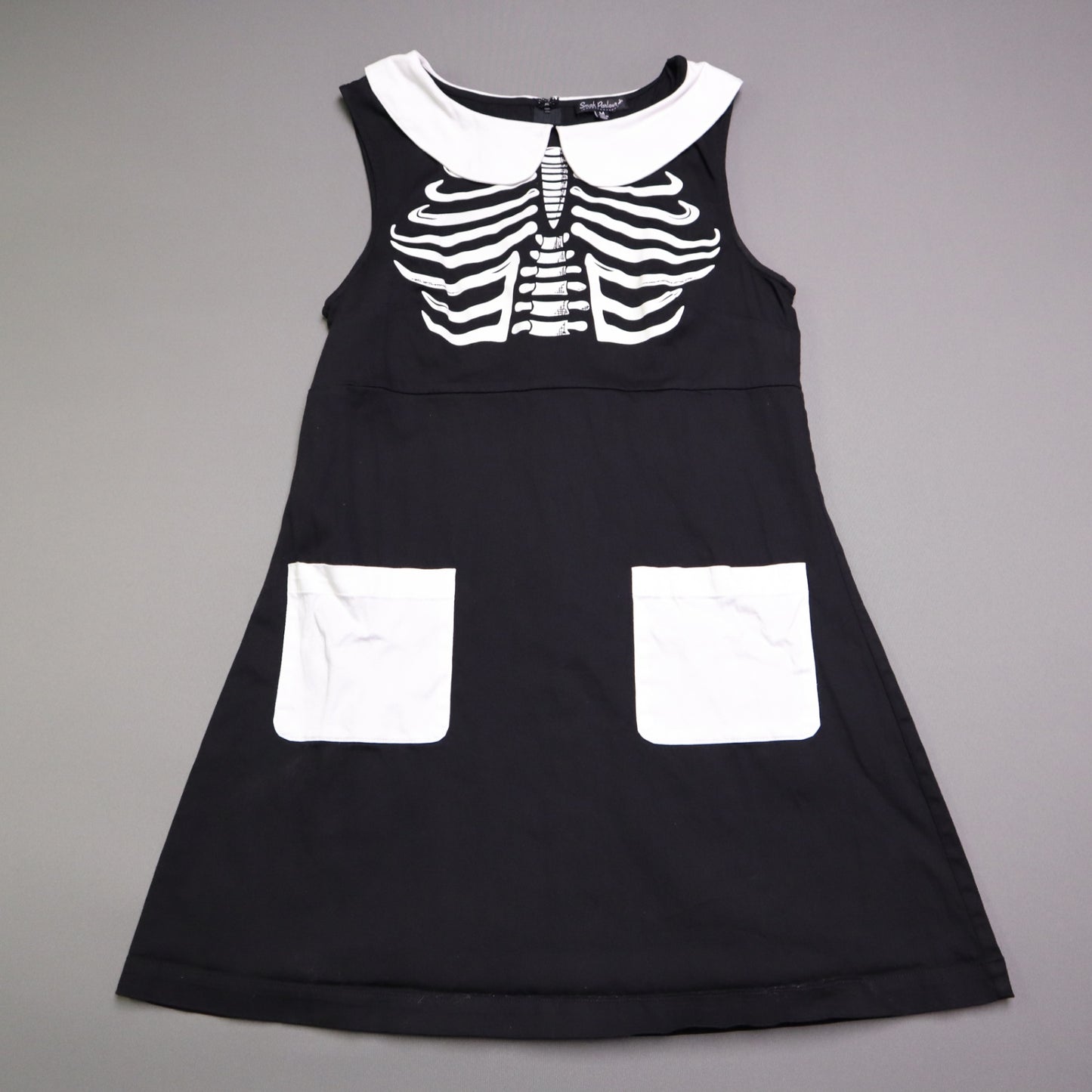 Smak Smak Parlour skeleton mod dress features a white Peter Pan collar and matching white pockets Online Only M