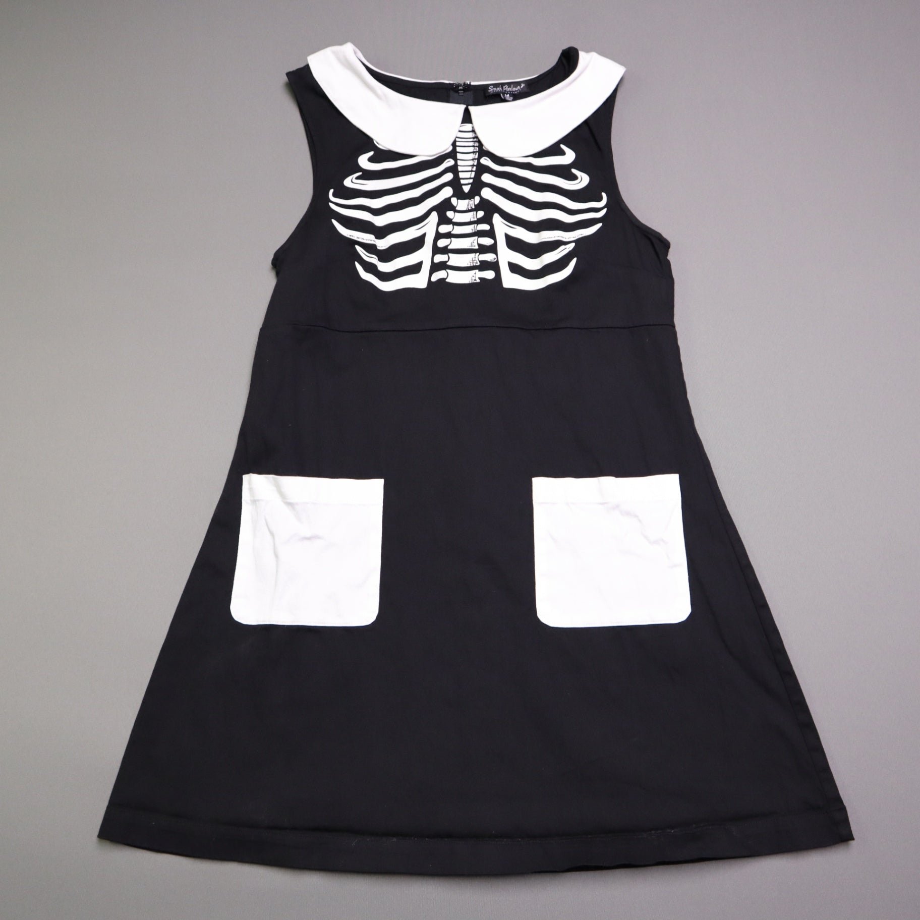 Smak Smak Parlour skeleton mod dress features a white Peter Pan collar and matching white pockets Online Only M