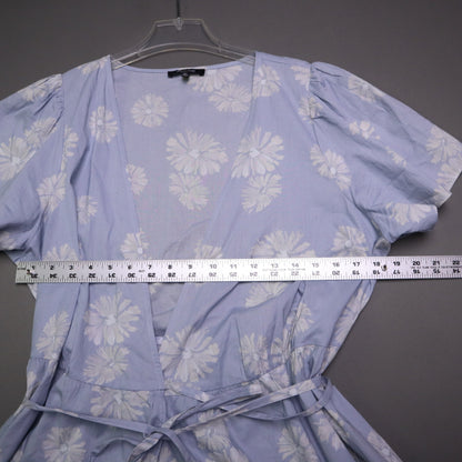 blue daisy floral wrap sundress is from Madewell and features short puff sleeves