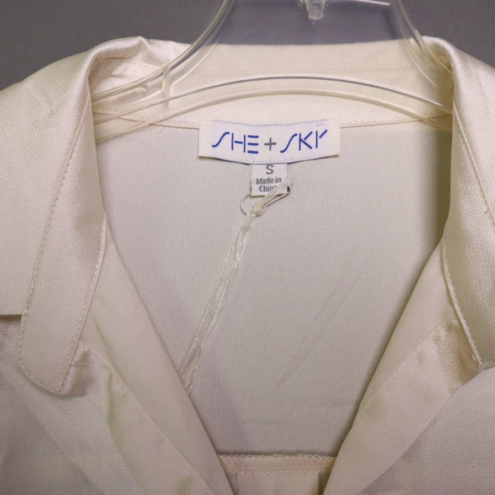 NWT SHE SKY Womens Small Cream Satin Twist Front Button Down Blouse Long Sleeve