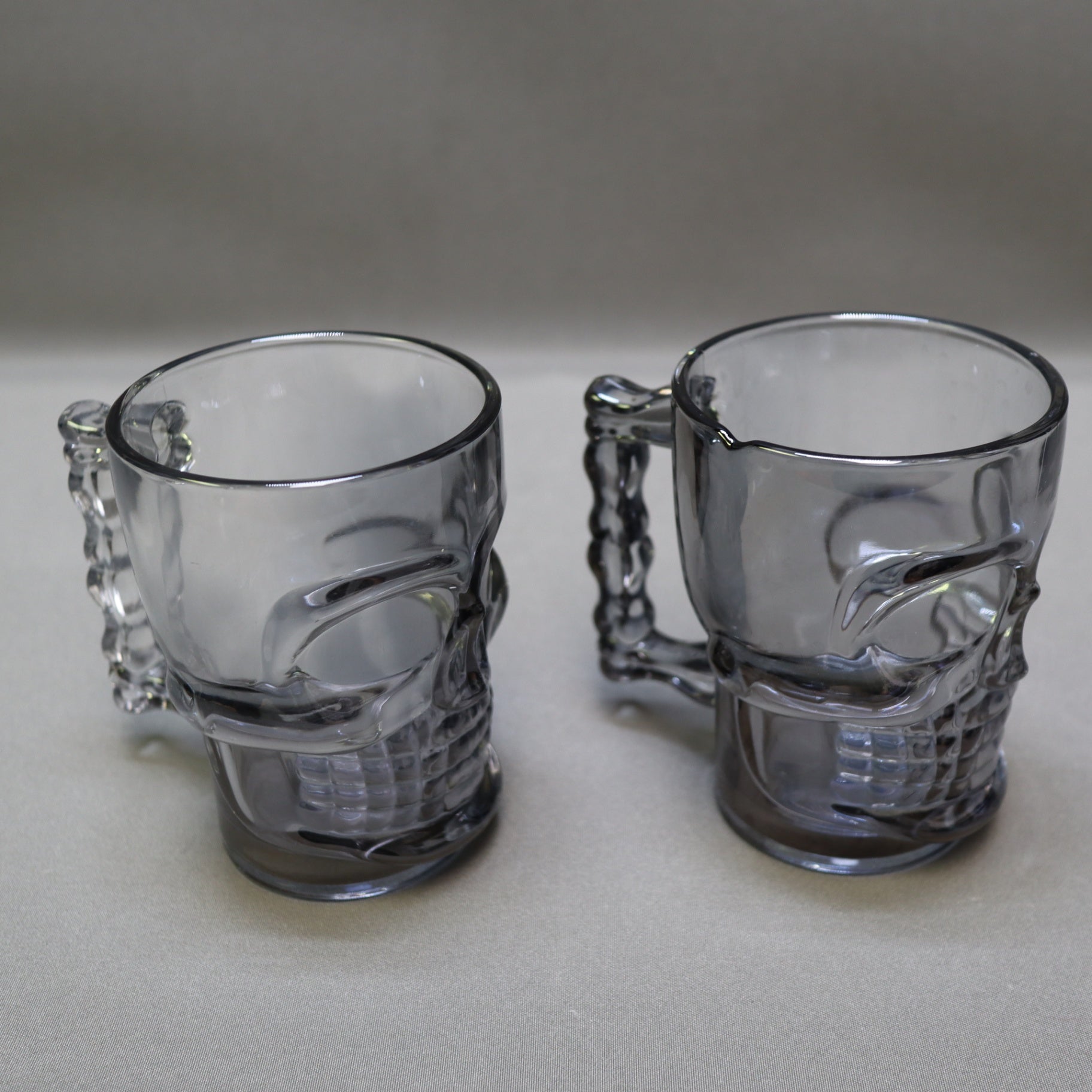 Set of 2 Vintage Deli Glass Skull Mugs Dark Smoked Black Tinted Beer Stein Barware