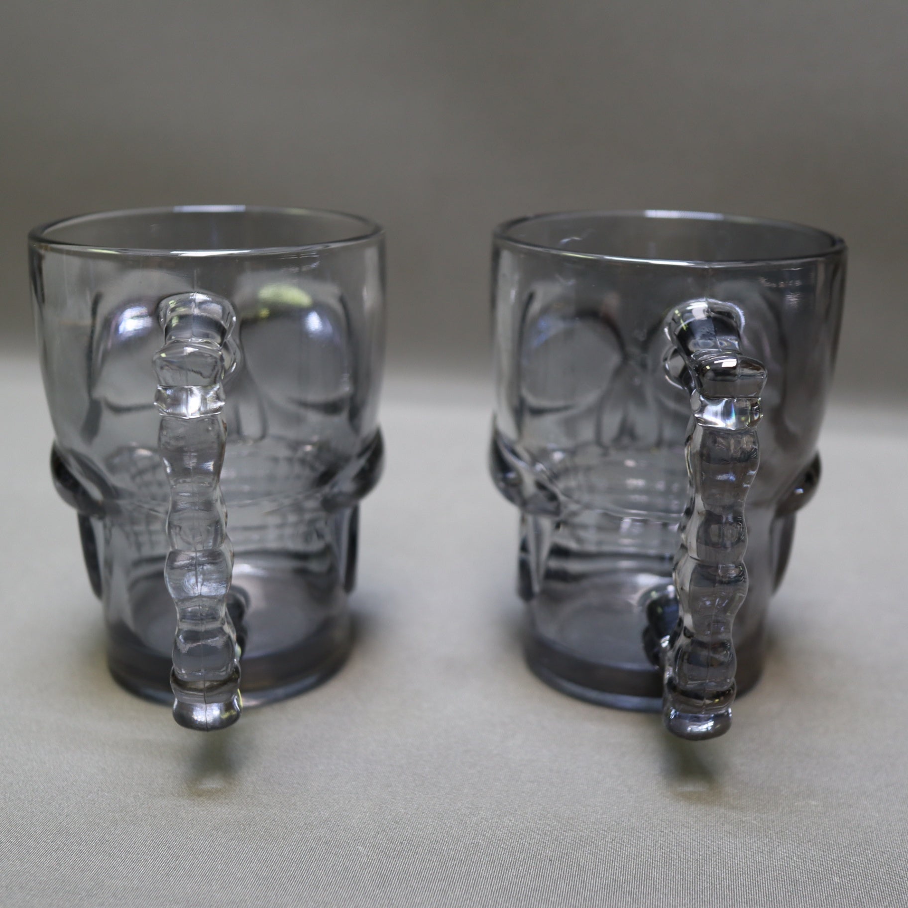 Set of 2 Vintage Deli Glass Skull Mugs Dark Smoked Black Tinted Beer Stein Barware